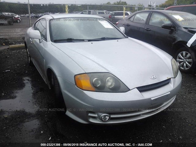 KMHHM65D34U122786 - 2004 HYUNDAI TIBURON SILVER photo 6