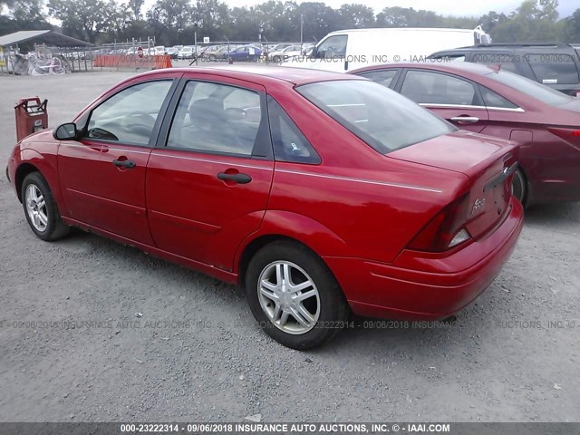 1FAFP34354W120901 - 2004 FORD FOCUS SE COMFORT/SE SPORT RED photo 3