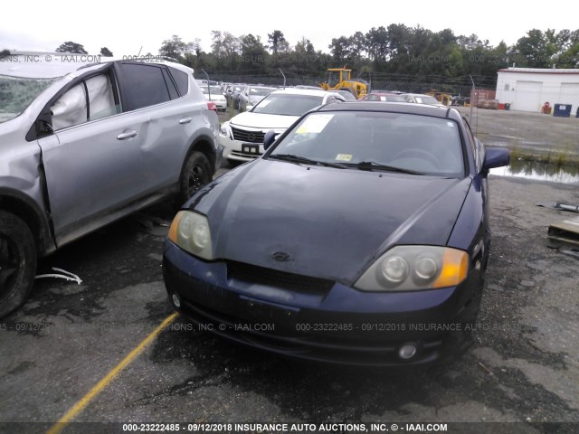 KMHHM65D33U004980 - 2003 HYUNDAI TIBURON BLUE photo 6