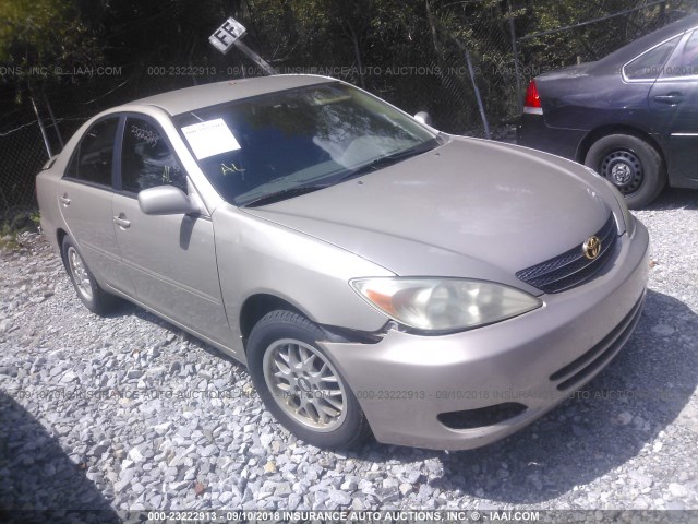 4T1BE32K23U213292 - 2003 TOYOTA CAMRY LE/XLE/SE GOLD photo 1