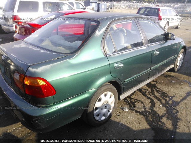 2HGEJ6619XH559463 - 1999 HONDA CIVIC SE GREEN photo 4