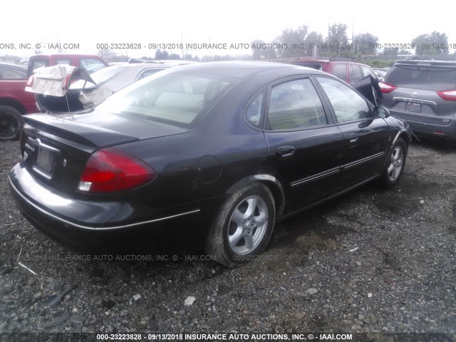 1FAFP55S53G182129 - 2003 FORD TAURUS SES BLACK photo 4