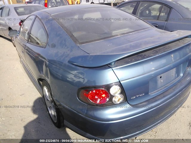 6G2VX12G04L243093 - 2004 PONTIAC GTO BLUE photo 3