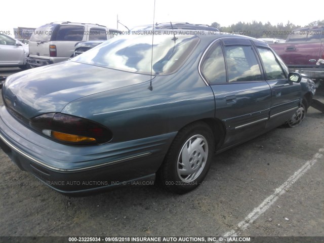 1G2HX52K7VH247930 - 1997 PONTIAC BONNEVILLE SE GREEN photo 4