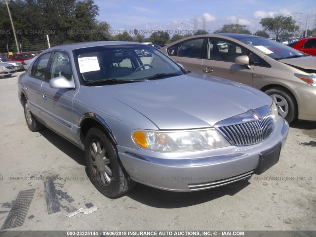 1LNHM97V8YY829971 - 2000 LINCOLN CONTINENTAL  SILVER photo 1