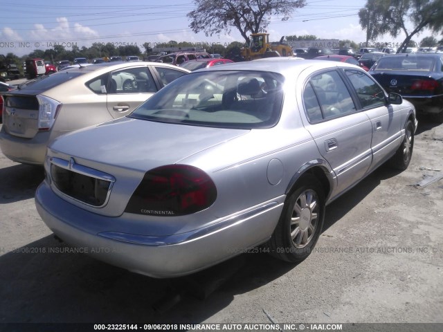 1LNHM97V8YY829971 - 2000 LINCOLN CONTINENTAL  SILVER photo 4