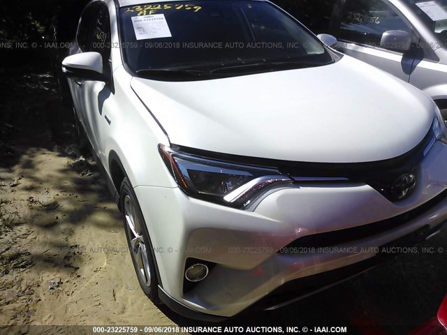 JTMDJREV0GD029766 - 2016 TOYOTA RAV4 HV LIMITED WHITE photo 6