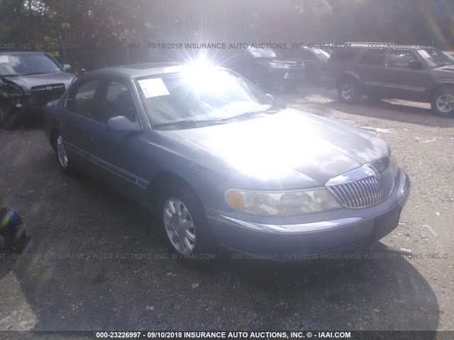 1LNHM97V3XY626517 - 1999 LINCOLN CONTINENTAL  Blau Foto 1