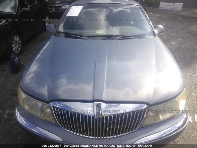 1LNHM97V3XY626517 - 1999 LINCOLN CONTINENTAL  Blau Foto 6