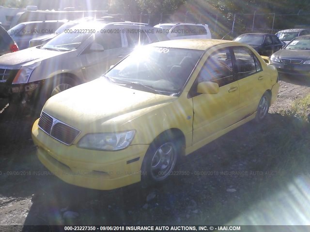 JA3AJ86E42U074938 - 2002 MITSUBISHI LANCER OZ RALLY YELLOW photo 2