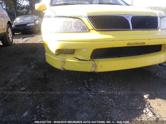 JA3AJ86E42U074938 - 2002 MITSUBISHI LANCER OZ RALLY YELLOW photo 6