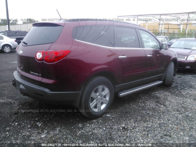 1GNLRFED7AS141436 - 2010 CHEVROLET TRAVERSE LT RED photo 4