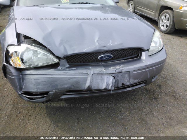 1FAFP56U66A228638 - 2006 FORD TAURUS SEL BLUE photo 6