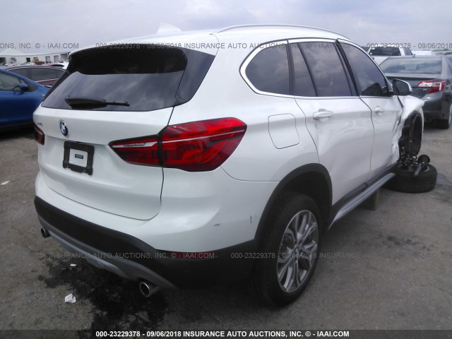 WBXHU7C38H5H38655 - 2017 BMW X1 SDRIVE28I WHITE photo 4