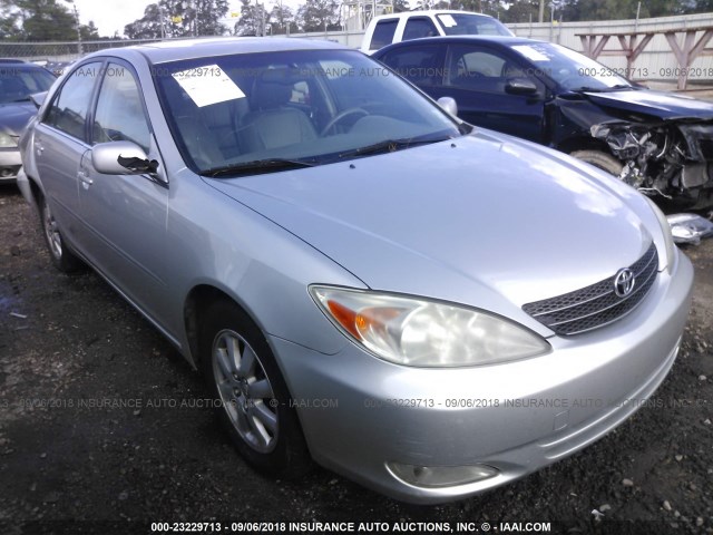 JTDBF30K640152011 - 2004 TOYOTA CAMRY LE/XLE SILVER photo 1