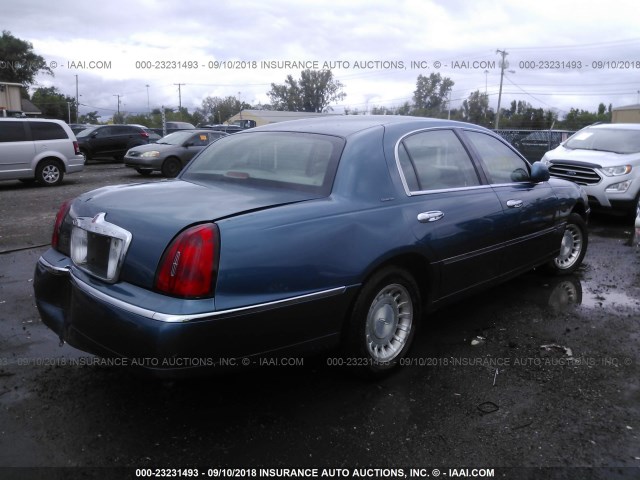 1LNHM81W32Y615800 - 2002 LINCOLN TOWN CAR EXECUTIVE Бирюзовый фото 4