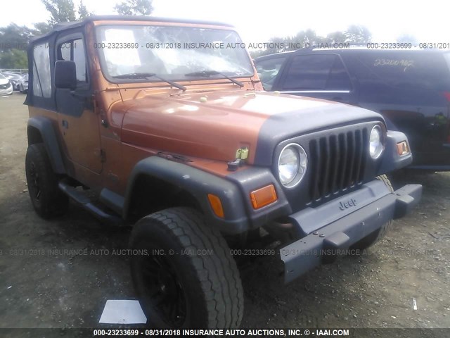 1J4FA29P01P317105 - 2001 JEEP WRANGLER / TJ SE ORANGE photo 6