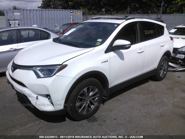 JTMRJREV4GD020543 - 2016 TOYOTA RAV4 HV XLE WHITE photo 2