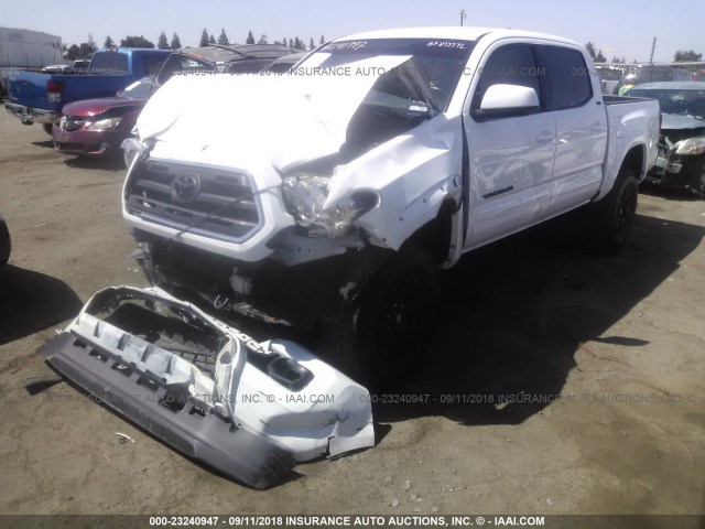 3TMAZ5CN8GM024911 - 2016 TOYOTA TACOMA DBL CAB/SR5/TRD SPORT/OR WHITE photo 2