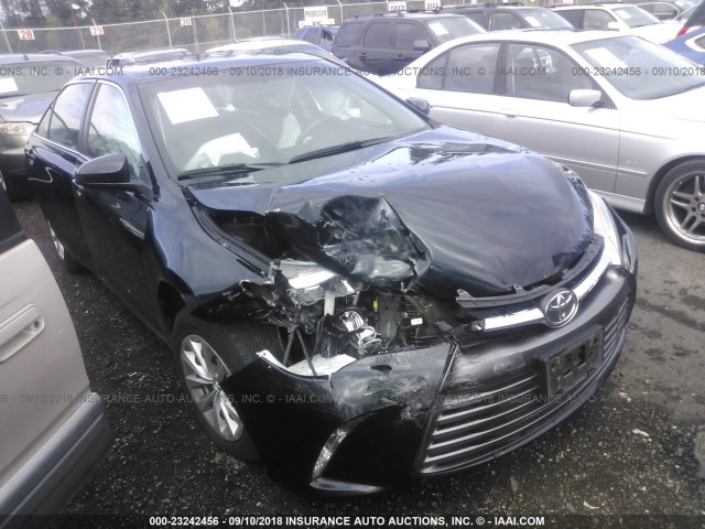 4T1BF1FK7GU594395 - 2016 TOYOTA CAMRY LE/XLE/SE/XSE 黑色 照片 1