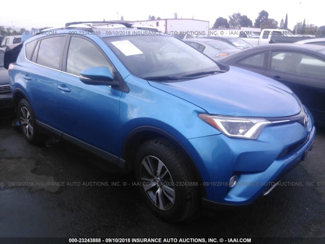 JTMWFREV2GJ082805 - 2016 TOYOTA RAV4 XLE BLUE photo 1