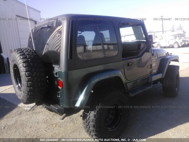 1J4FA59S1YP708912 - 2000 JEEP WRANGLER / TJ SAHARA GREEN photo 4