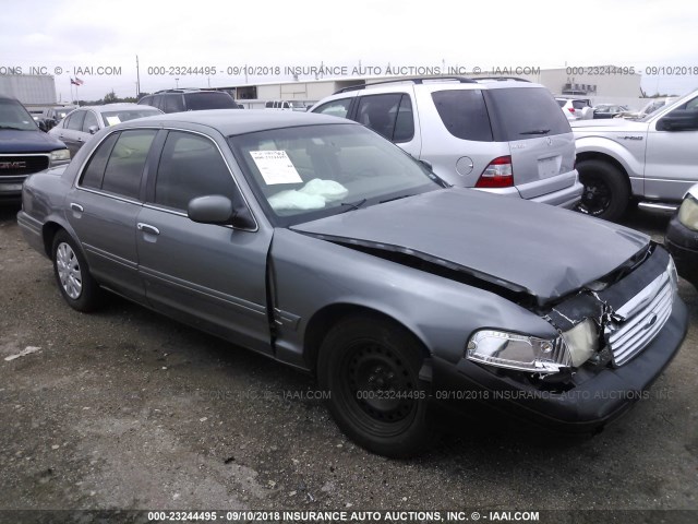 2FAFP73W1YX127650 - 2000 FORD CROWN VICTORIA  GRAY photo 1