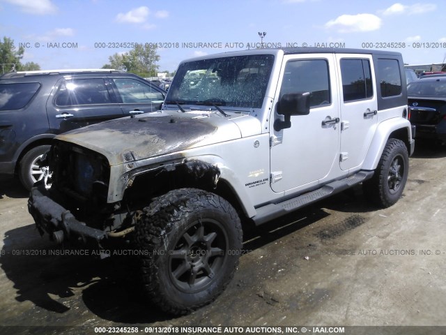 1J4GA59168L652808 - 2008 JEEP WRANGLER UNLIMITE SAHARA SILVER photo 2