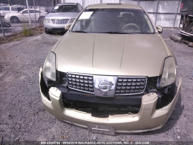 1N4BA41E14C872690 - 2004 NISSAN MAXIMA SE/SL GOLD photo 6