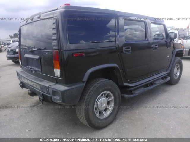 5GRGN23U04H112779 - 2004 HUMMER H2 BLACK photo 4