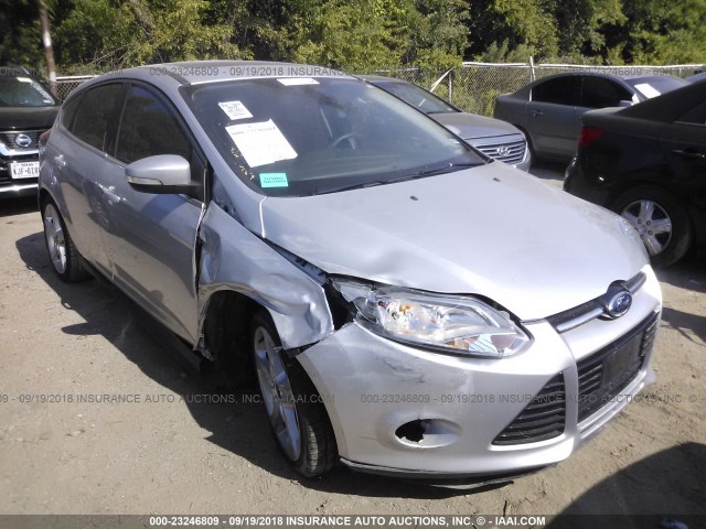 1FAHP3N27CL465894 - 2012 FORD FOCUS TITANIUM SILVER photo 1