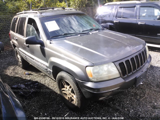 1J4GW68S7XC723305 - 1999 JEEP GRAND CHEROKEE LIMITED BLACK photo 1