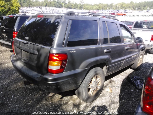 1J4GW68S7XC723305 - 1999 JEEP GRAND CHEROKEE LIMITED BLACK photo 4