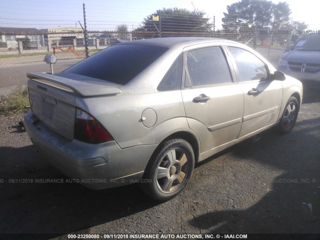 1FAFP34N77W135423 - 2007 FORD FOCUS ZX4/S/SE/SES GOLD photo 4