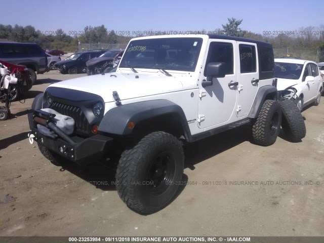 1C4BJWDGXCL152502 - 2012 JEEP WRANGLER UNLIMITE SPORT WHITE photo 2