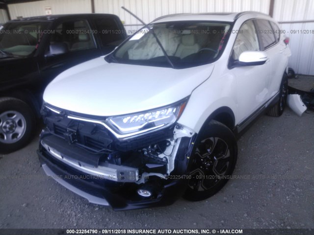 2HKRW2H90JH632506 - 2018 HONDA CR-V TOURING WHITE photo 6