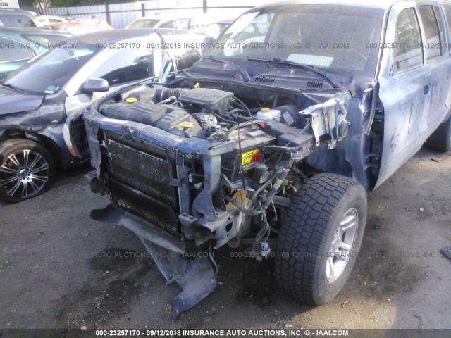 1D7HG38K74S504843 - 2004 DODGE DAKOTA QUAD SPORT BLUE photo 6