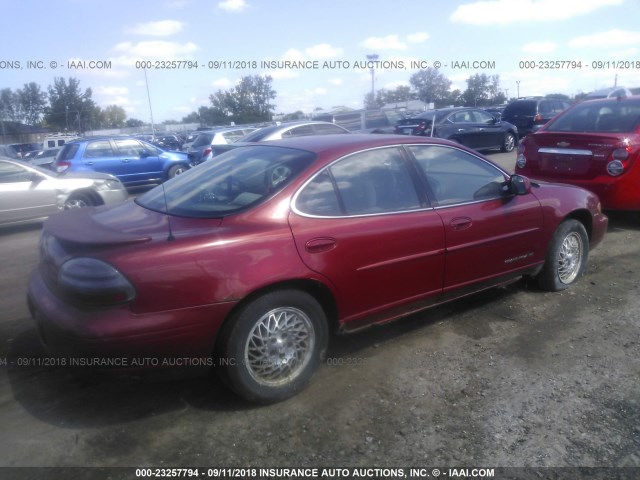 1G2WJ52K9VF242331 - 1997 PONTIAC GRAND PRIX SE MAROON photo 4