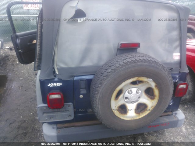 1J4FA29104P719058 - 2004 JEEP WRANGLER / TJ SE BLUE photo 6