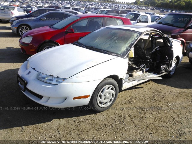 1G8ZP1287XZ341889 - 1999 SATURN SC1 WHITE photo 2