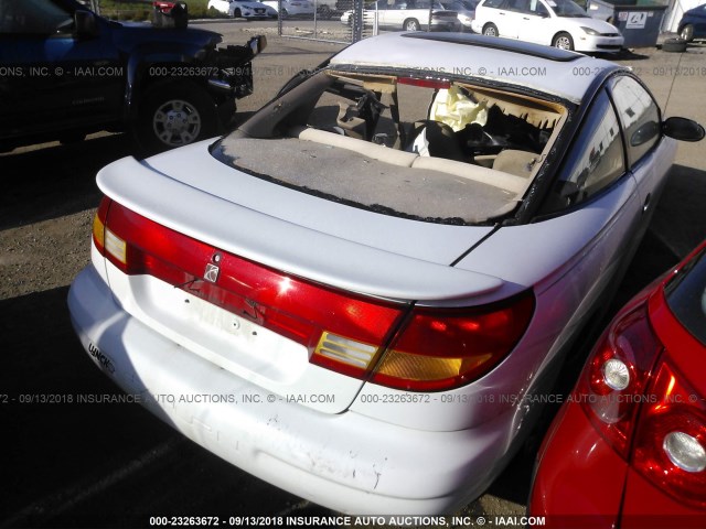 1G8ZP1287XZ341889 - 1999 SATURN SC1 WHITE photo 4