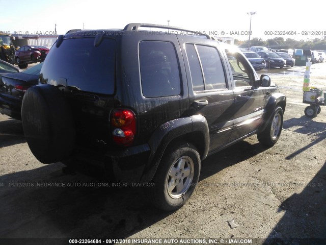 1J4GK58K33W626519 - 2003 JEEP LIBERTY LIMITED BLACK photo 4