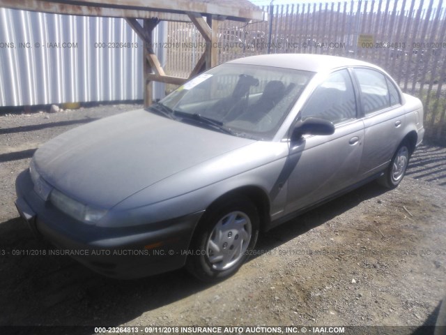 1G8ZF5283XZ182105 - 1999 SATURN SL SILVER photo 2