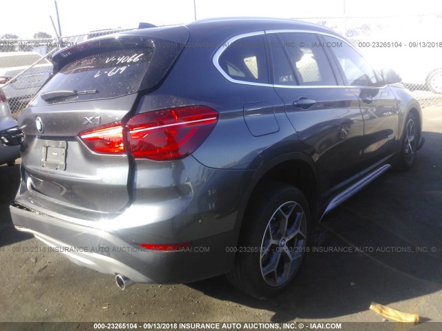 WBXHT3C31GP884066 - 2016 BMW X1 XDRIVE28I BLACK photo 4