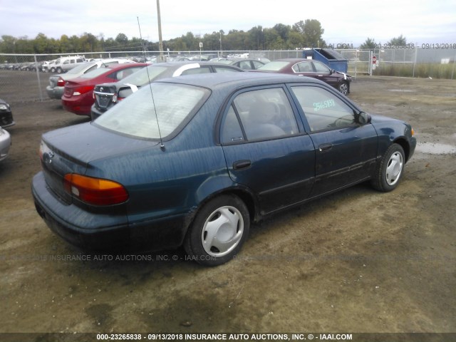 1Y1SK52872Z419704 - 2002 CHEVROLET GEO PRIZM LSI BLUE photo 4