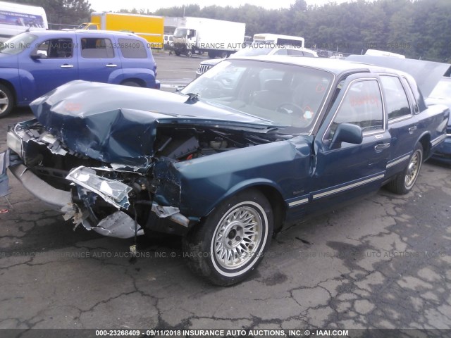 1LNLM81W7VY641721 - 1997 LINCOLN TOWN CAR EXECUTIVE GREEN photo 2