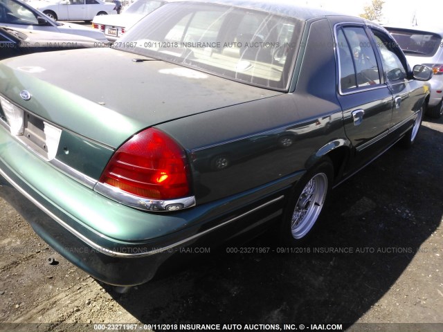 2FAFP74W4YX126765 - 2000 FORD CROWN VICTORIA LX GREEN photo 4