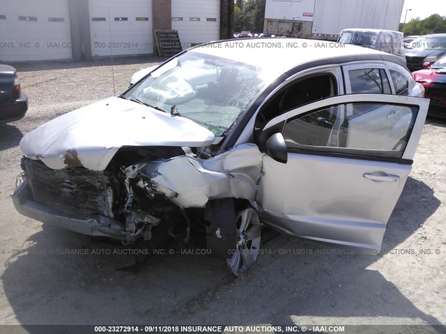 1B3CB3HA0BD118164 - 2011 DODGE CALIBER MAINSTREET SILVER photo 2