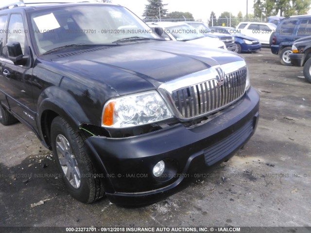 5LMFU28RX4LJ37036 - 2004 LINCOLN NAVIGATOR Schwarz Foto 6