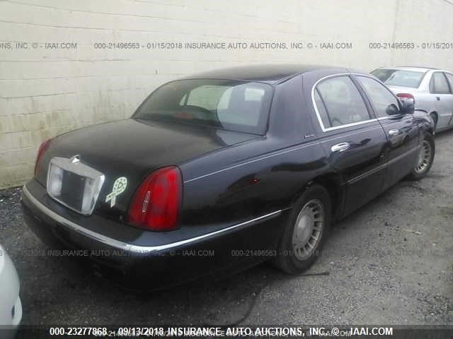 1LNHM81W3YY794302 - 2000 LINCOLN TOWN CAR EXECUTIVE BLACK photo 4